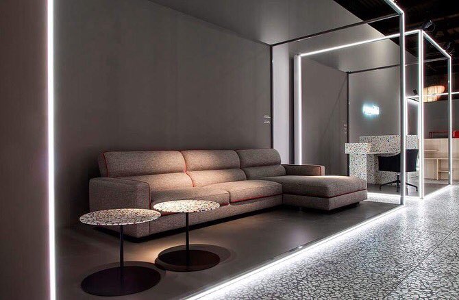 Poltronafraume's tweet photo. Cappellini @ Milan Design Week 2018: a selection of our new collection @ Rho Fiera stand in a scenery made of vivid and white neon light to emphasize the stylistic language of this project and add value to the textures used at the surface. https://t.co/u998hz789l