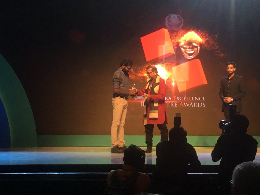 METAwards's tweet photo. Designing a space that visually communicates the theme & emotion of the play is an integral part of theatre. And, Jino Joseph wins a much deserved award for 'Best Stage Design' for Nona at the #13thMETA awards night. #Congratualtions https://t.co/WtMLKwVDyh