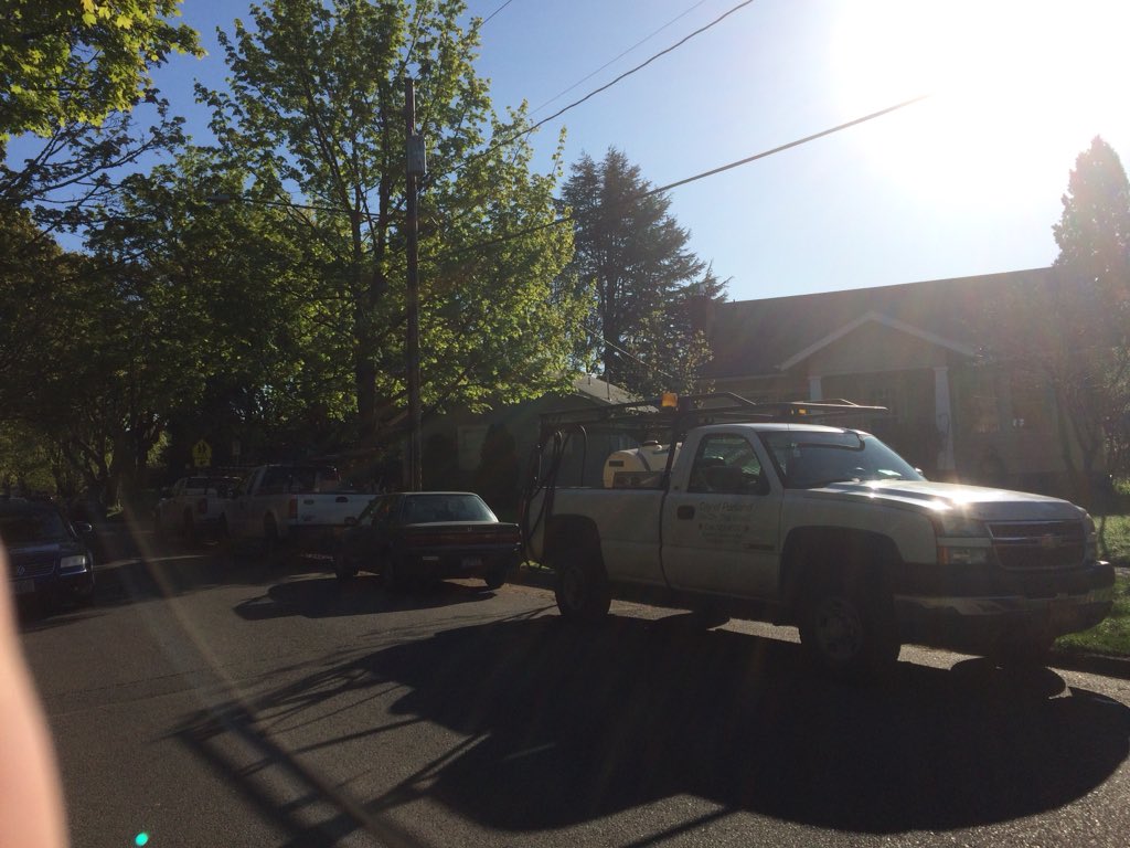 KYouell's tweet photo. Today's "not a safe route to school" bright to you by @PBOTinfo. Every truck in this photo plus one that waffle parked in the crosswalk that just left and the cement mixer on the right was idling. Crossing guards had to breathe that for how long? #BadScheduling https://t.co/3Iu9PcsNZ2