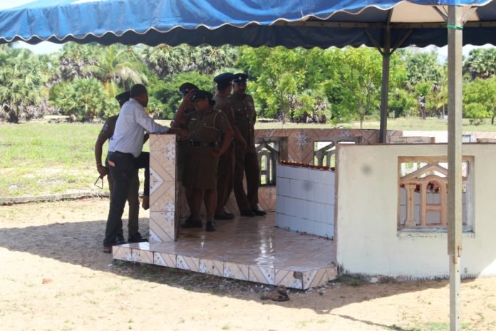 garikaalan's tweet photo. Special police security was provided today during commemoration events of #Annai #Poopathi at her memorial in #Nawaladi #Batti;organizers demanded police remove their shoes inside the memorial site. #WeRememberYou https://t.co/6rmAXALvAx