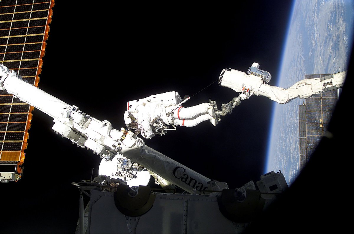 Canada's tweet photo. Canadian Astronaut Chris Hadfield and the STS-100 crew launched an 11-day mission #OTD in 2001. While installing the #Canadarm2 on the International Space Station, @Cmdr_Hadfield became the first Canadian to perform a spacewalk! 📷:@NASA https://t.co/uIS4PwUGLl