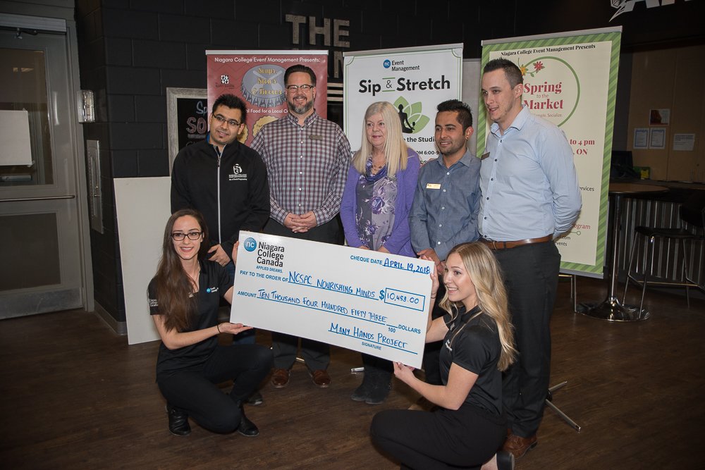 niagaracollege's tweet photo. Today our @EventMgmtNC students unveiled the total $ raised from this year's fundraising events for @NCManyHands Project. $10,453 goes to @yourNCSAC Nourishing Minds Program &amp; $16,800 goes to @communitycarest. Well done, students 👏 Full story: https://t.co/Lidhl3mafW #myncstory https://t.co/M34zhV219K