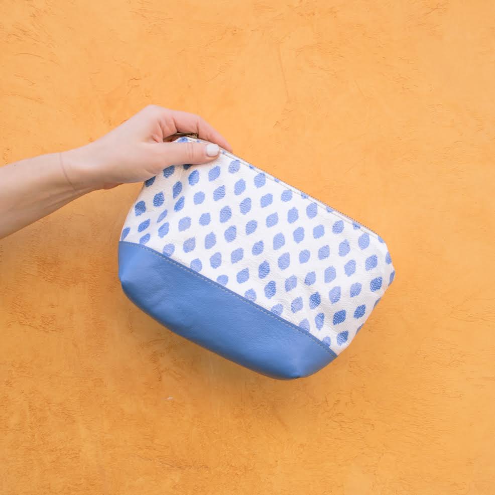 We're feelin' our laminated pacific dot with our new cadet blue leather!! How about you!? Tap to shop! #Veeshee #cosmeticbag