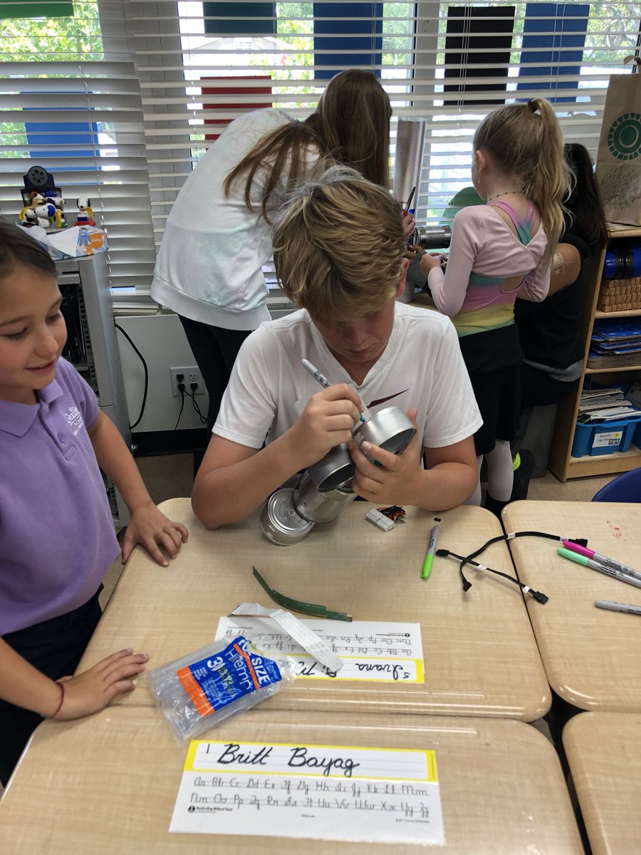Gulliver Academy Spirit Week Matchup! Eight graders and second graders work on robots that will save the Everglades! @GulliverSchools #gslearning
