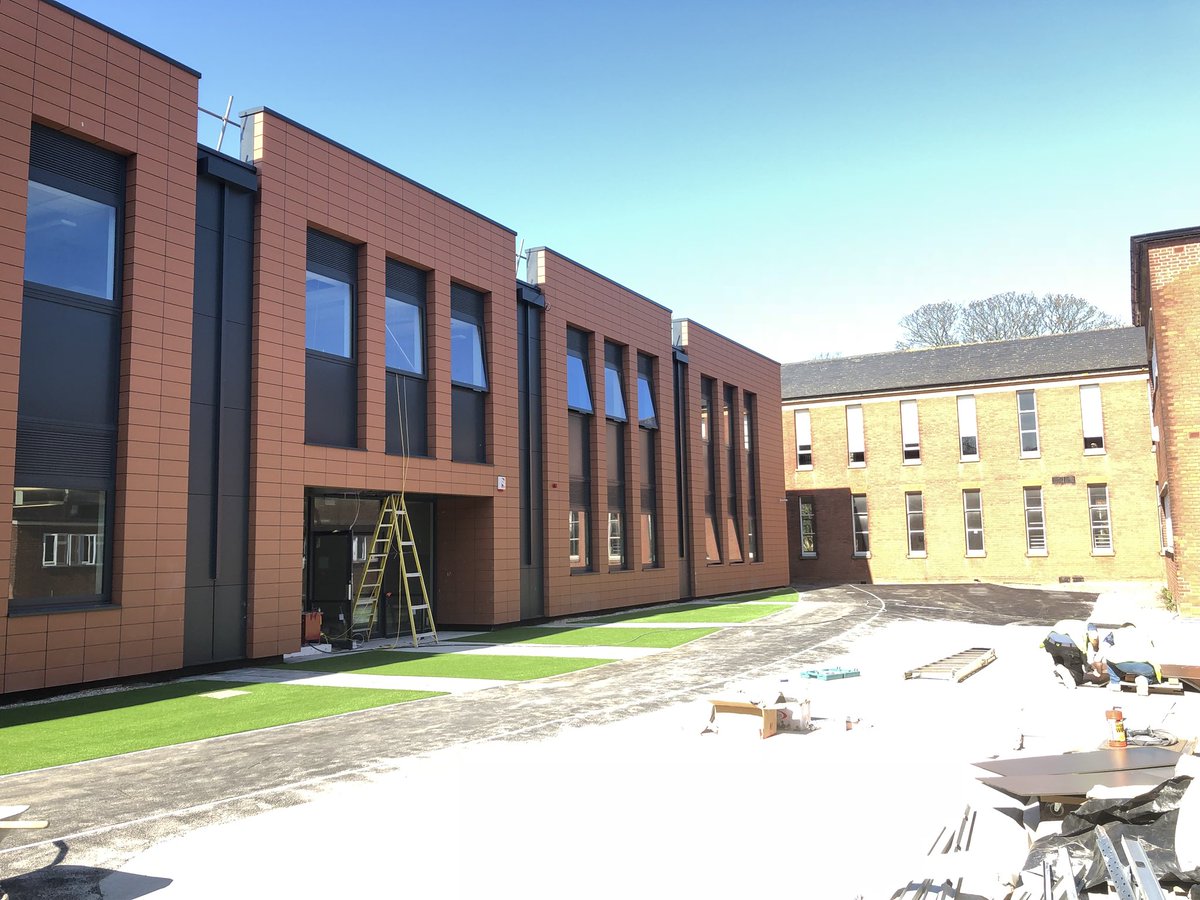 Wavyhall's tweet photo. Our new Fort Pitt GGS science building basking in the Sun today just add grass. #terracottacladding @HMYArchitects https://t.co/MPbE9NAC8P