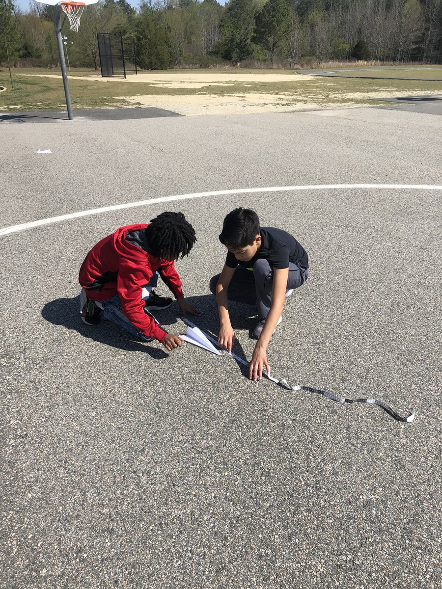 5thWithHicks's tweet photo. What a fun way to review for our math test tomorrow- paper airplane challenges this morning to practice using our ballpark measurement conversions! @ScottScorpions https://t.co/MyALTTNOwy