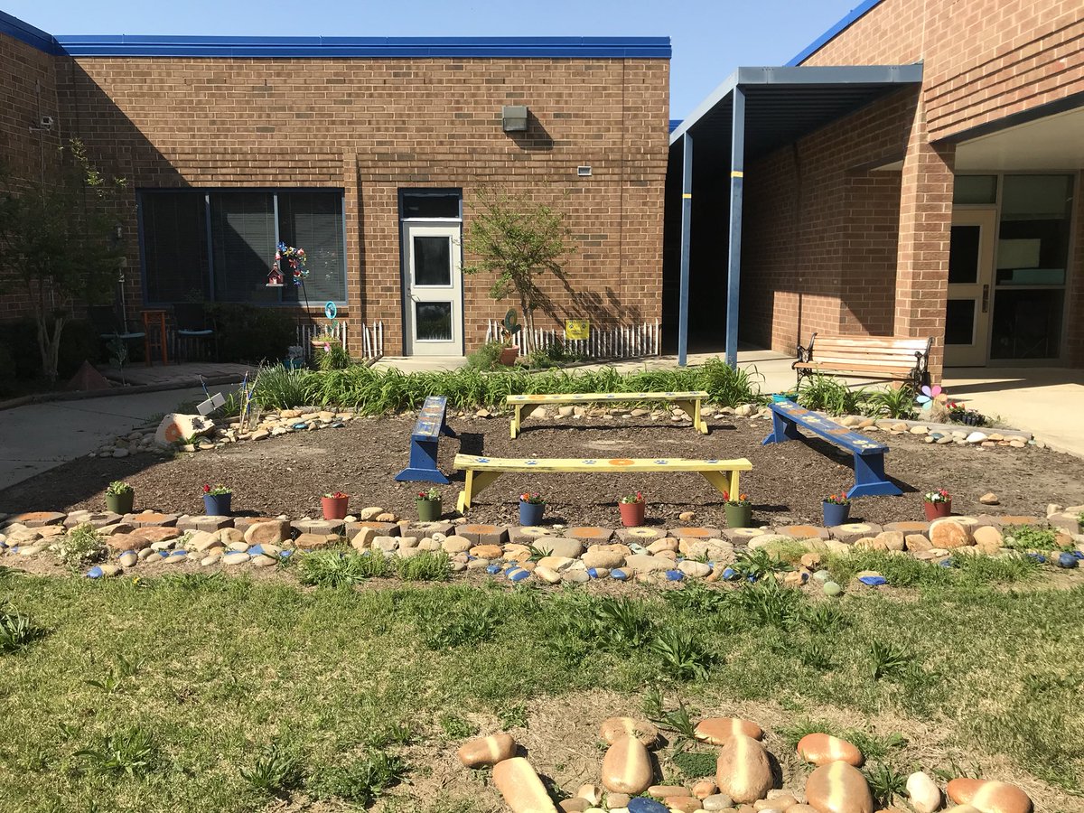 MsLambertSTEM's tweet photo. Our Girls On The Run team worked so hard to clean up the courtyard today, they planted flowers and cleaned out the weeds! Doesn’t it look great? @WingateES_NC @educatingall @APShanda https://t.co/86XACuf55z