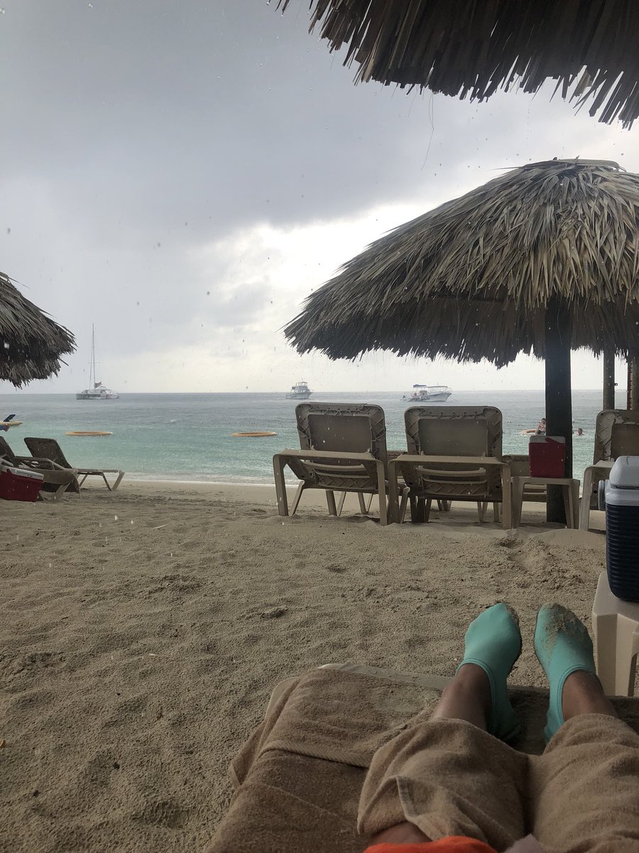 bvhukill's tweet photo. Watching it rain on a beach a world away from home doesn’t quite seem fair. #prayforOK https://t.co/RBhcZUtWka