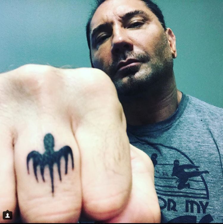 bondmovies's tweet photo. ZOMG @DaveBautista's Spectre tattoo is badass...back for Bond 25? #JamesBond https://t.co/OrnWELMrfk