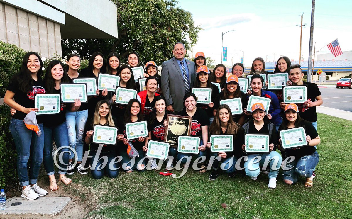 thesangerscene's tweet photo. Sanger High School Competition Cheer Squad was recognized by Sanger City Council for winning the 2018 CIF Division III Valley Championship. Here is the cheer squad with their recognition certificates, with Sanger Mayor Frank Gonzalez. #sangercheer #competitionsquad #valleychamps https://t.co/4w8QgMbzzi