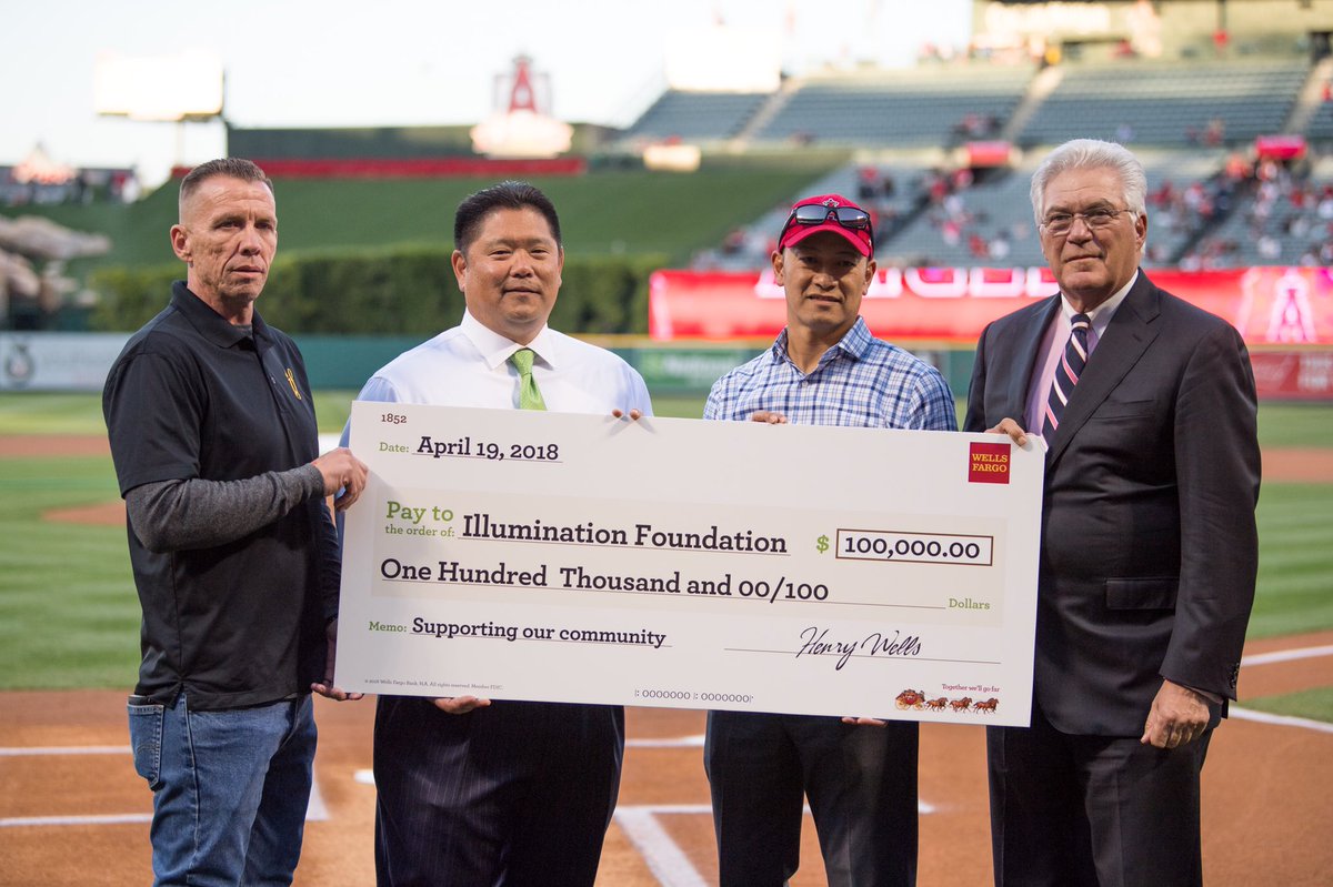 Angels's tweet photo. Tonight, we welcomed Wells Fargo and our Community Hero, Illumination Foundation, to Angel Stadium. Wells Fargo provided a $100,000 grant to support their work in helping to solve homelessness in Orange County. Thank you both for your commitment to building a better community. https://t.co/UU0WJ3bgHG