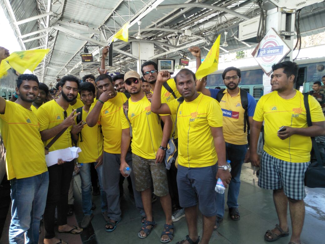 TOIPlus's tweet photo. All aboard the #WhistlePoduExpress: #CSK fans arrive in Pune to cheer for the team as they get ready to take on @rajasthanroyals! 
Check out more pictures, here: https://t.co/CogcX2Hu41 https://t.co/4i2YddWonB