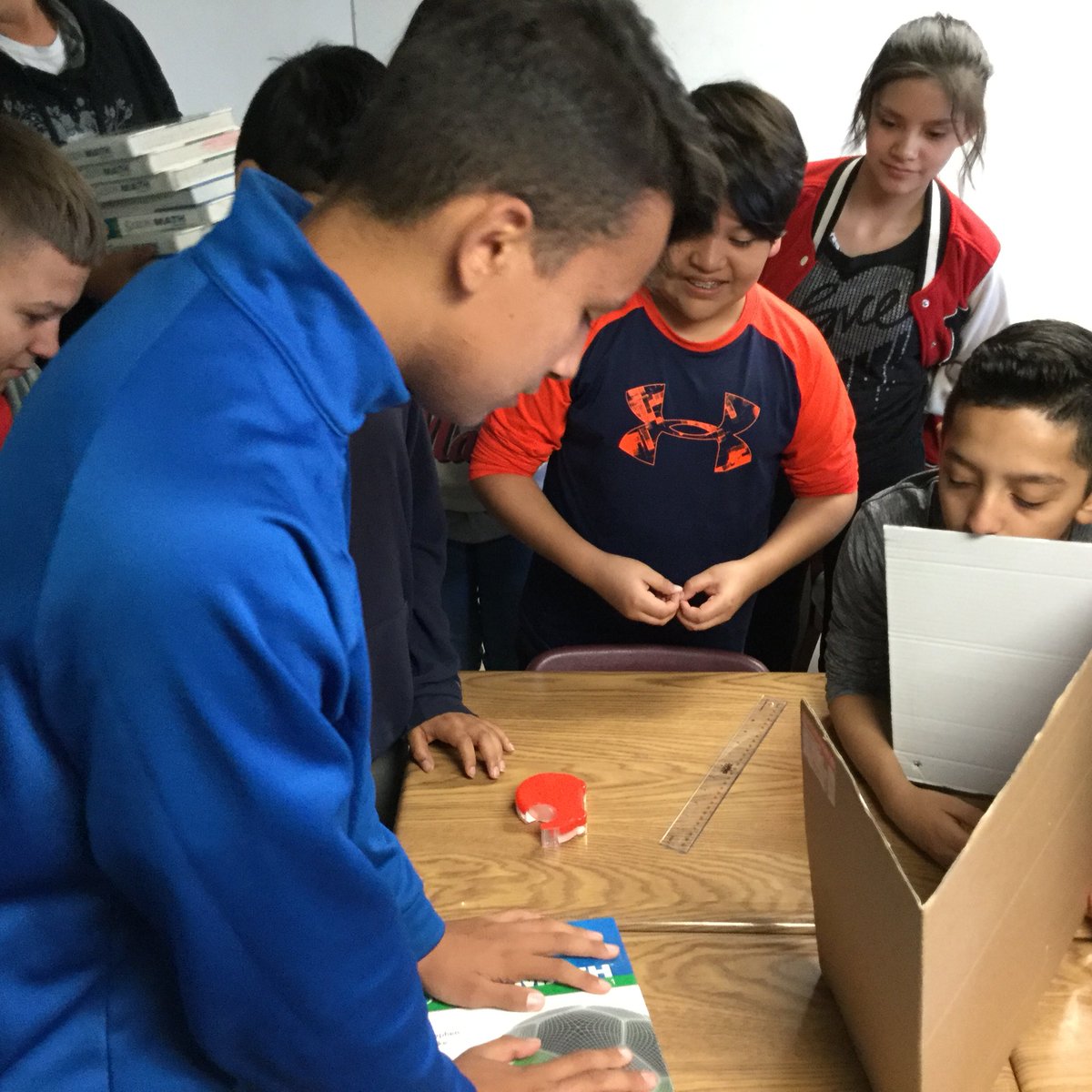 WESJefferson5's tweet photo. Engineering Challenge 3: Using only materials provided to build a structure to hold the most textbooks at least 1in above desk! #wes56 #cpsred https://t.co/PqXA76MsYJ