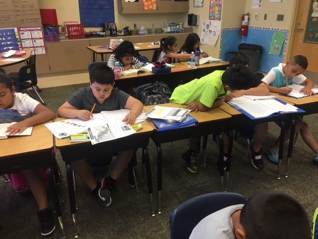 WLES_OCPS's tweet photo. The #ELA block is serious business in Ms. Martin's class. Students are busy working on their #iReadyWorkbooks, #ExtendedResponse and #IndependentReading. 👍😀 #KeepUptheHardWork #ExpectSuccessNothingLess #GettingReadyforFourthGrade https://t.co/YNcXoKPbuS