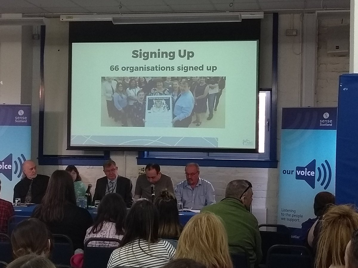 SenseScotland's tweet photo. Ross Smith asks our Chief Executive Andy Kerr to officially sign us up to the Charter for Involvement, which allows people to have a bigger say in how they can be supported to live their lives. #NationalInvolvementNetwork. #OurVoiceAtSenseScotland #TouchBaseGlasgow https://t.co/Oj7i7J01ys