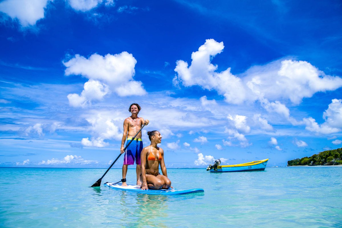 Barbados's tweet photo. With our clear waters and year round warm temperatures, what are some of your favourite beach activities in Barbados? #LoveBarbados https://t.co/FWiLPa9xNW