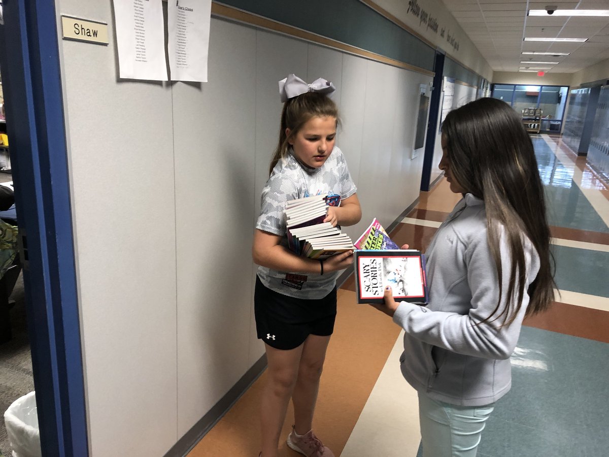 Curtis Leadership Team surprising teachers with books they purchased from T-shirt sales for classroom libraries. Why to GO CURTIS ROOS!🎉 #curtises #whywisd