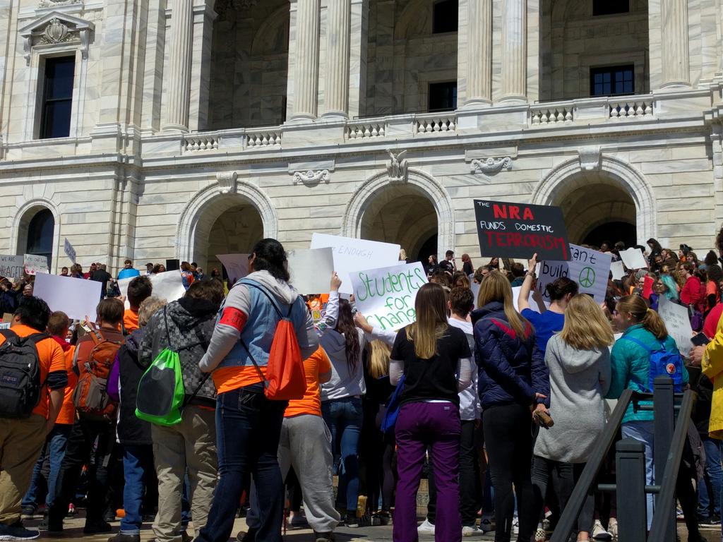 swastvedt's tweet photo. "Enough is Enough!" Students fill Capitol steps to protest gun violence @MPRnews #NationalSchoolWalkout https://t.co/pEAkIfwNHW