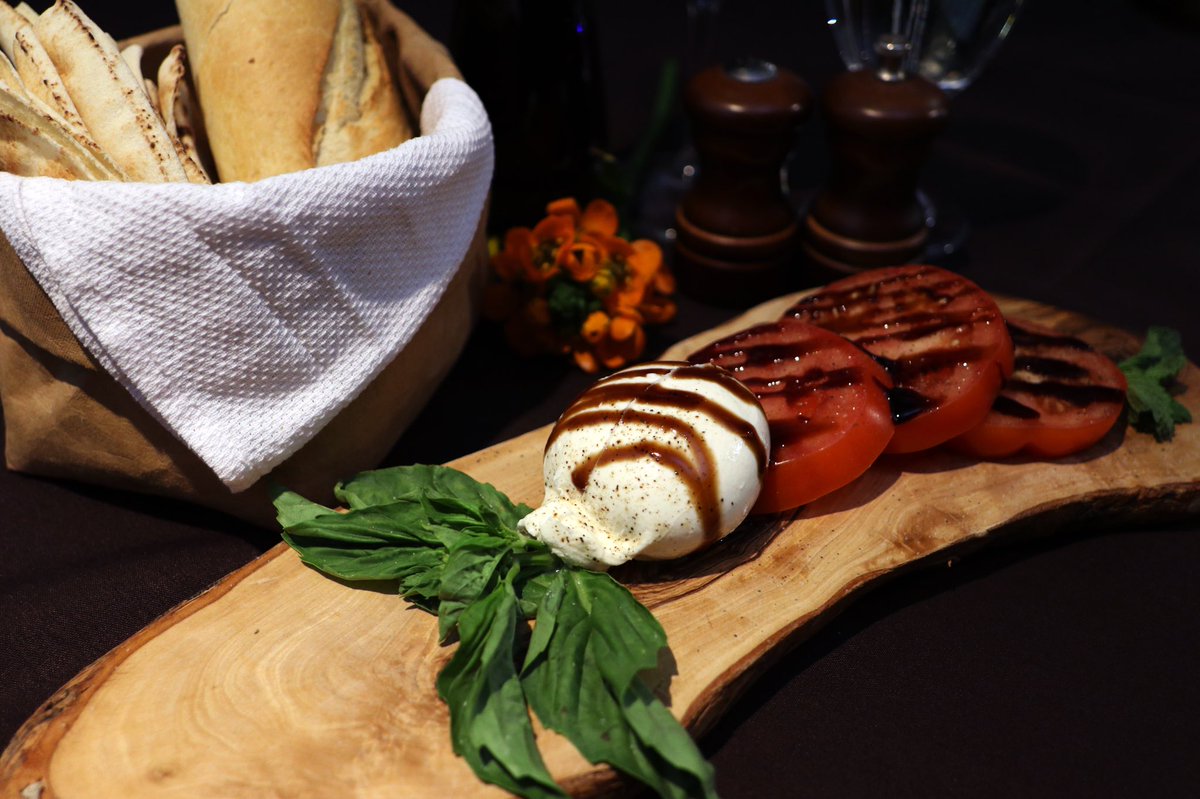eddy_embistro's tweet photo. Here’s one of our newest menu options! Caprese Salad, we are actually the only ones in Windsor that use Fresh BelGioioso Mozzarella, with sliced heirloom tomatoes, fresh basil and glazed with a balsamic reduction. Come try it out! https://t.co/1LD90KP2Mx