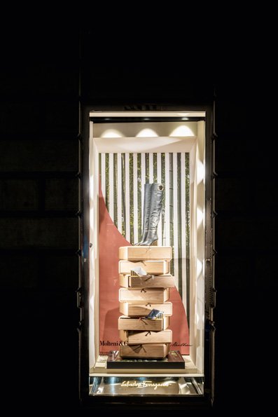 Ferragamo's tweet photo. Until April 22nd, the store windows on Via Montenapoleone in both the Men's & Women's boutiques are dressed for #milanomodadesign week featuring the Hertiage Collection by @MolteniDada. https://t.co/9zkhgoi7d7