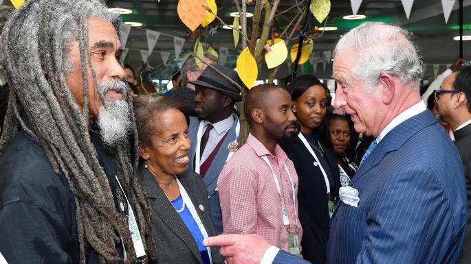 TheRoyalGazette's tweet photo. Bermudian author and former Bermuda College lecturer Angela Barry meets Prince Charles | @SarahLaganLife | https://t.co/S1qPqmcuo9 https://t.co/BNp04Hav2z
