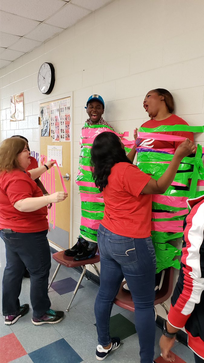 apsBAMOAcademy's tweet photo. Part 3: faculty joined in to make sure things were secure 😉 for @jbradfordco & @Robinviews pink&green tape but someone added red and white!! @pointsbyPortee @ReadwithLee @TuttleTips @DrEmilyAMassey @apsupdate #apsmedia #ReadingGoalsMet https://t.co/3xONzeUYmb