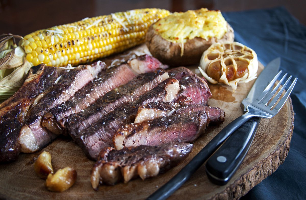 Grilled Ribeye Steaks with Soy Butter Glaze and Roasted Garlic is an easy way to create a most succulent meal without worry of overcooking such a great cut of meat. ow.ly/1QSq30jzKUA  #napoleongrill #bbq