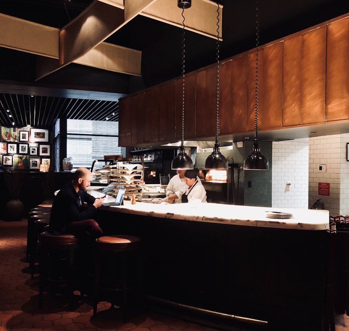 Our #NYC pizza bar is the perfect place to carb up, sip wine, or check those emails...but carbs first. Always. #casanonna