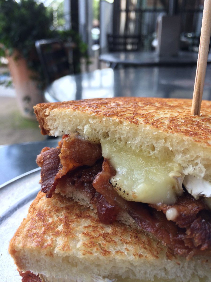 Your lunch special is waiting for you at Noble.   Crispy bacon, melted Brie, black pepper and strawberry jam.  #baconparty