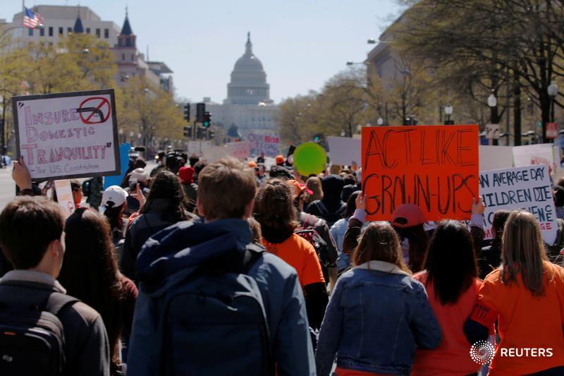 reuterspictures's tweet photo. Thousands of students walk out of classes to mark the 19th anniversary of the massacre at Columbine High School https://t.co/QL5p0W9wUd #NationalSchoolWalkout https://t.co/3oZaOfah4A