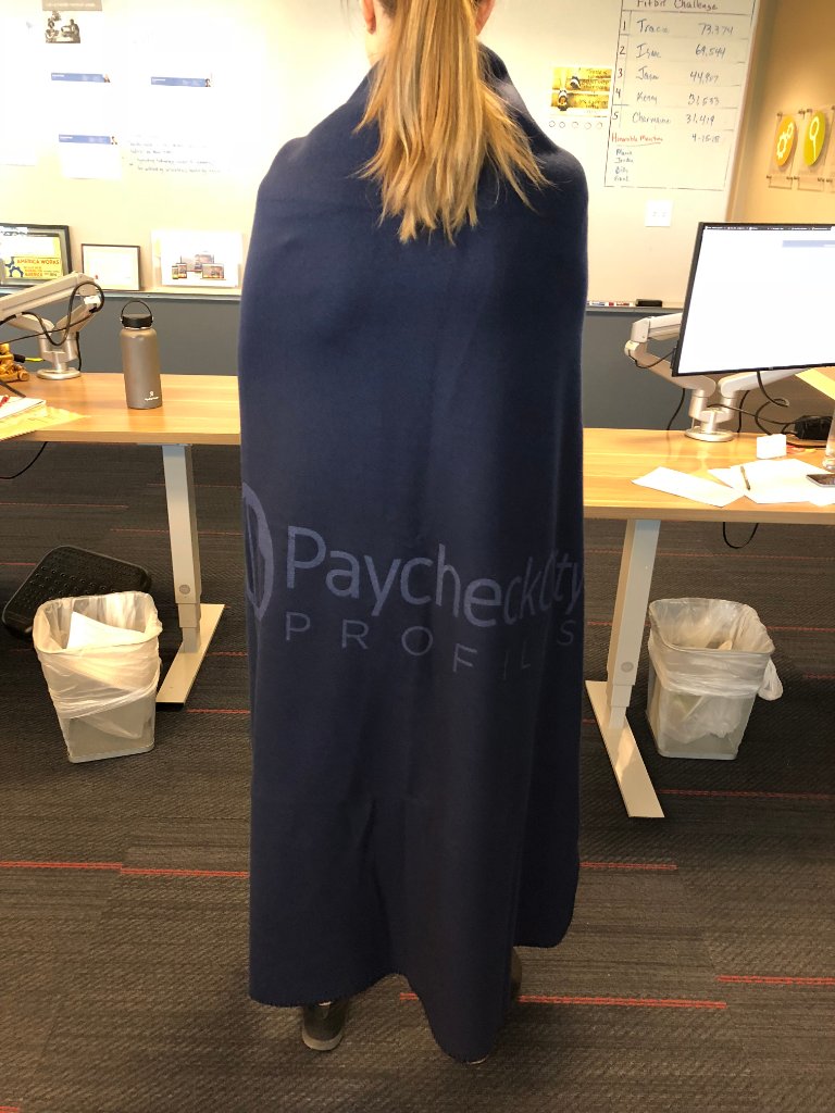 PaycheckCity's tweet photo. Headed to @PayNews #paycon next month? Stop by our booth, learn about PaycheckCity Profiles, and get this cozy blanket! #booth1007 https://t.co/jomIErAP1f
