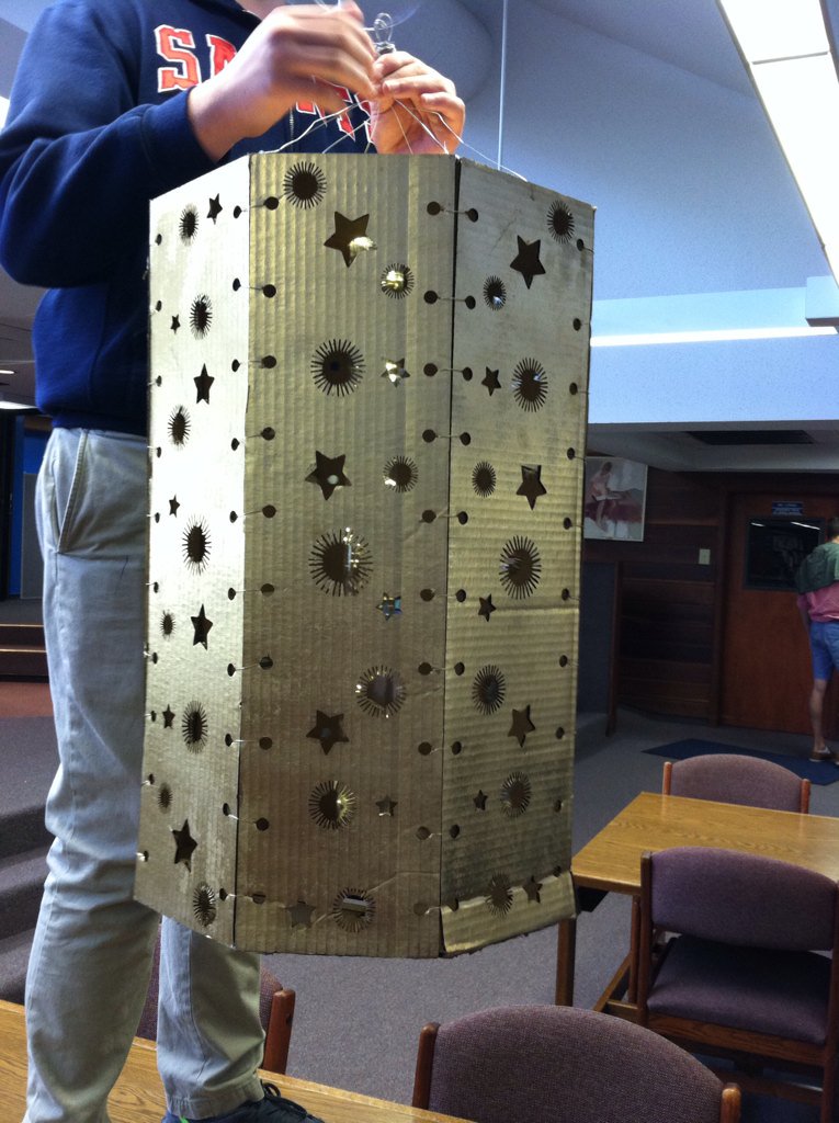 Librarystm's tweet image. Allison Thomas&apos;s art students hanging this awesome installation that was designed using our school&apos;s laser cutter