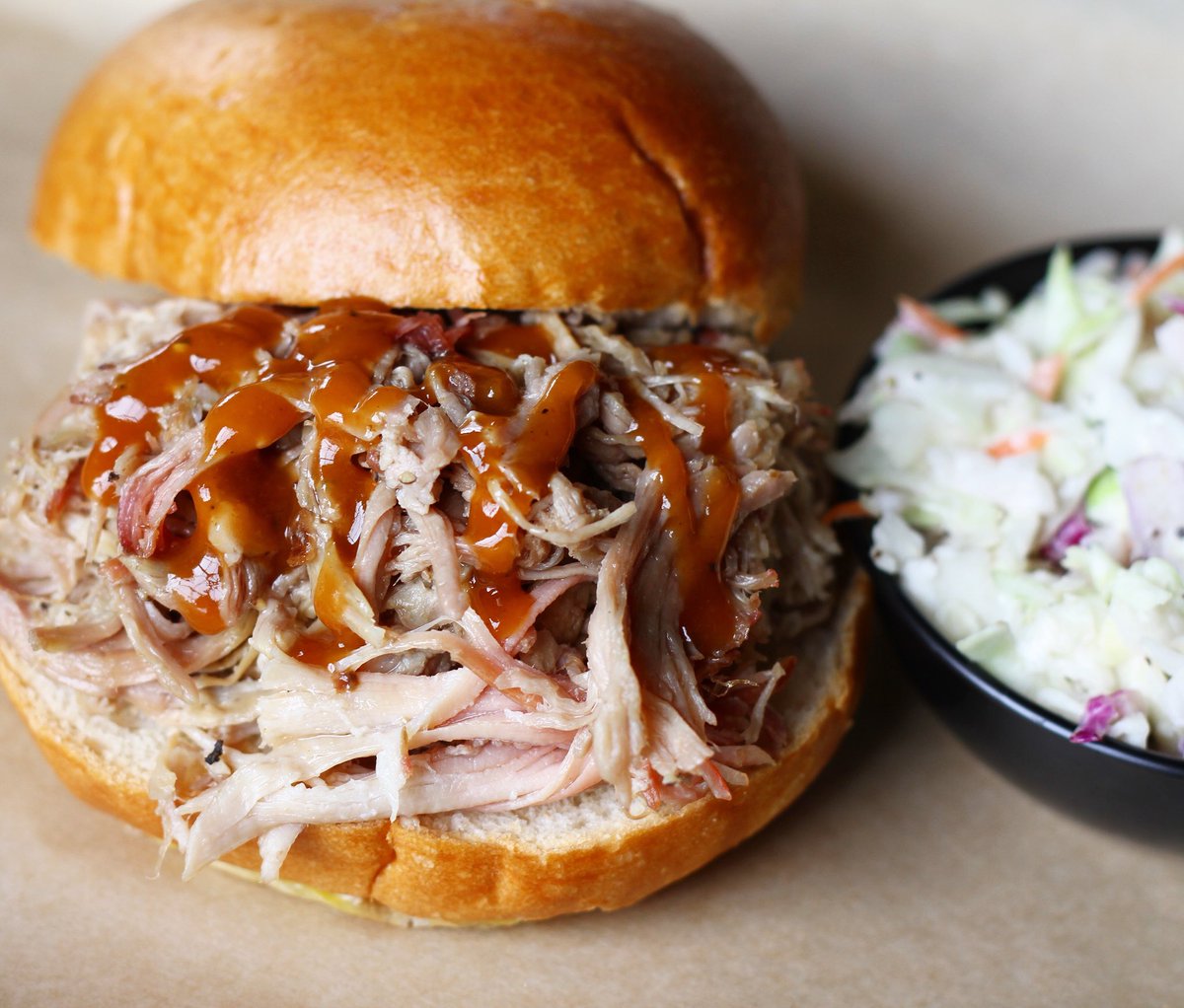 DRRoadhouse's tweet photo. MMM...how could you resist this tender and juicy Roadhouse Pulled Pork BBQ.  #RvaDine #EatRva #RvaMusic https://t.co/SqI7ZXryjz