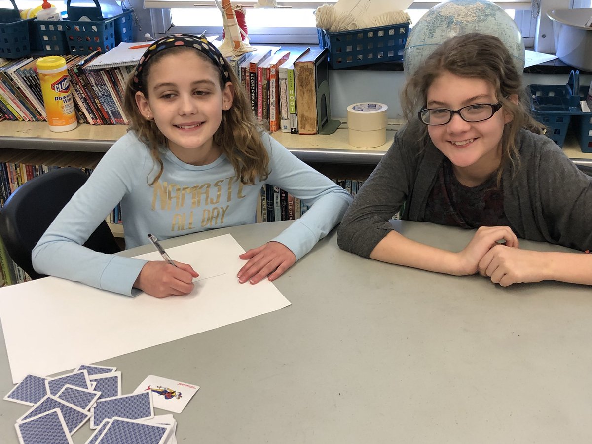 DonnaShank's tweet photo. Making bridges without anything but scissors and playing cards.  Must hold the weight of one soda can!   @LHCS311 https://t.co/hVIpTcSyKX