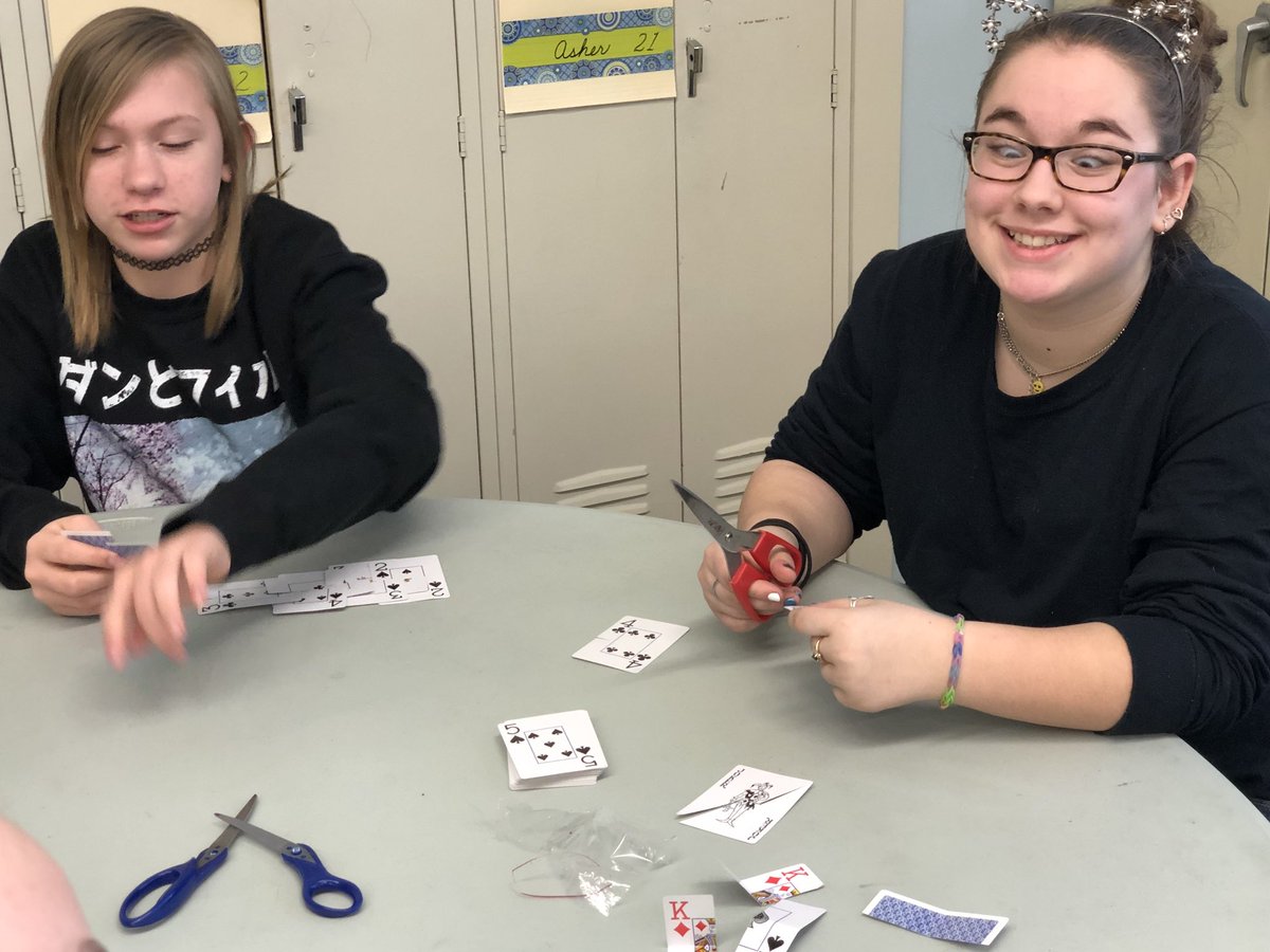 DonnaShank's tweet photo. Making bridges without anything but scissors and playing cards.  Must hold the weight of one soda can!   @LHCS311 https://t.co/hVIpTcSyKX