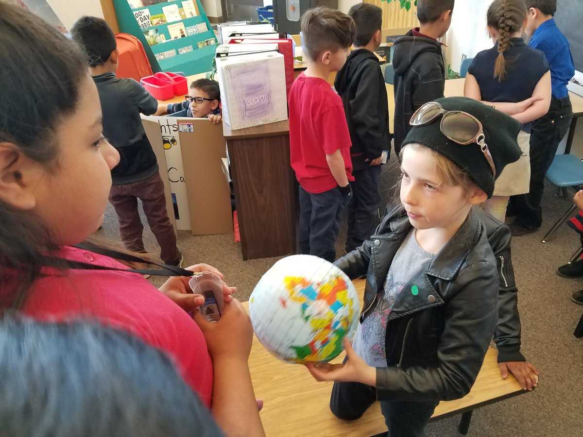 andysclass's tweet photo. The kids are giving their speeches to visiting classes. What a crowd! #WeAreNES https://t.co/L9UB1osXsN