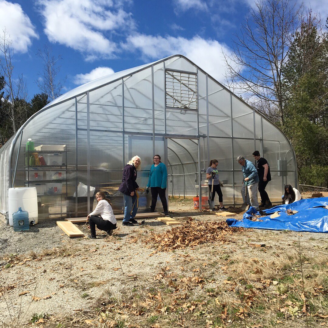 HBMSGreenhouse's tweet photo. Green Group worked hard today building and planting a new bed outside of the greenhouse! Thank you Tom and Brenda from the UNH Master Gardener program for all your help! Happy Earth Day! #hbmsgg https://t.co/Q2r04JrTsm