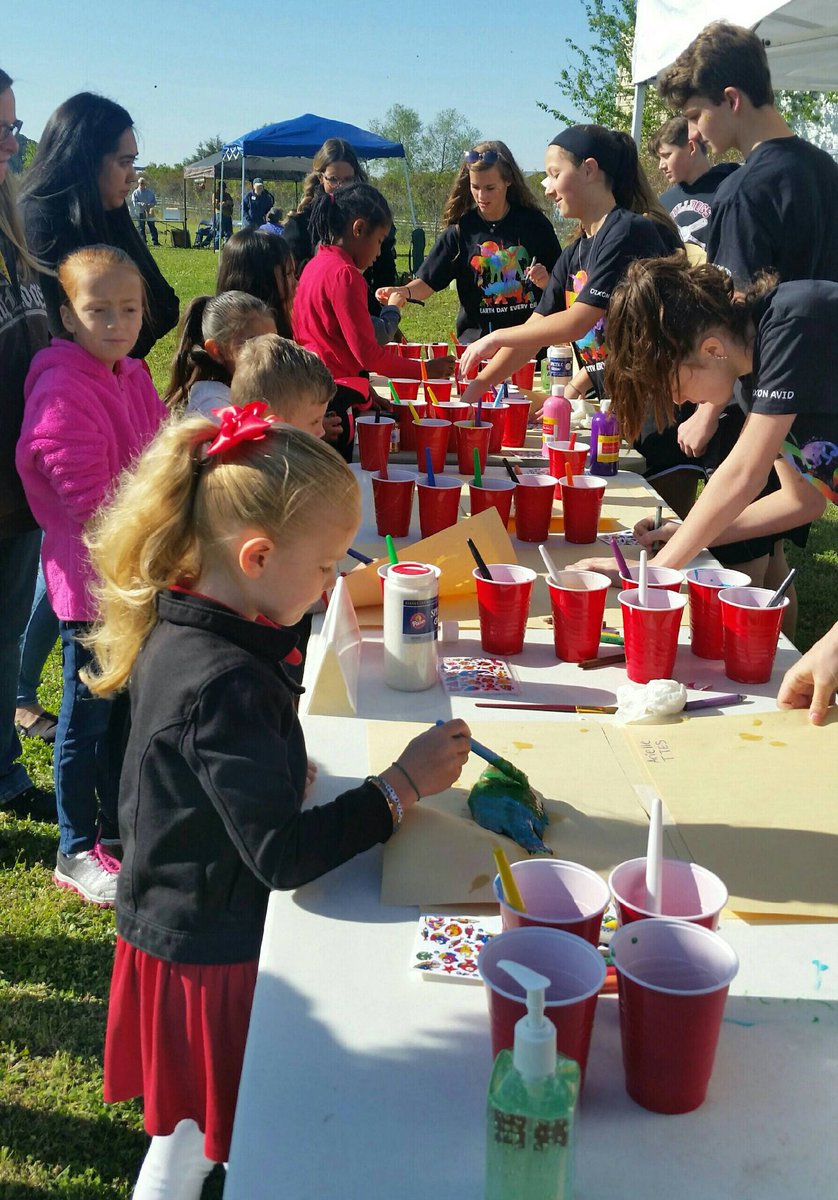 AVID 8th grade participating in Earth Day events at Sturgeon City.