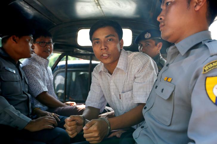 Reuters's tweet photo. Myanmar police 'set up' @Reuters reporters in sting, says police witness: https://t.co/EtGoIFpVCI Follow latest on detained journalists Wa Lone and Kyaw Soe Oo: https://t.co/63a6KCaNCV https://t.co/nXEs2bwkb2