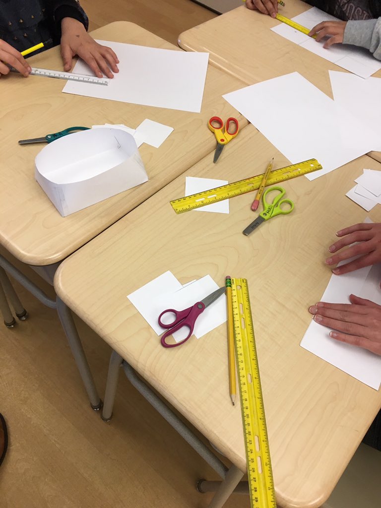c_hansen21's tweet photo. Hands on math today with a Maximizing Volume activity! We predicted that cutting smaller squares out of the corner would lead to a higher volume for our popcorn containers. #WeAreHB #HBMSPride #engageHB https://t.co/KuFQgGLRNK