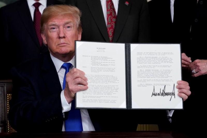Reuters's tweet photo. Trump's next $100 billion tariff dilemma: hit Wal-Mart or Apple Store? https://t.co/XjmAQ6jAh5 https://t.co/em9SlAAgSq