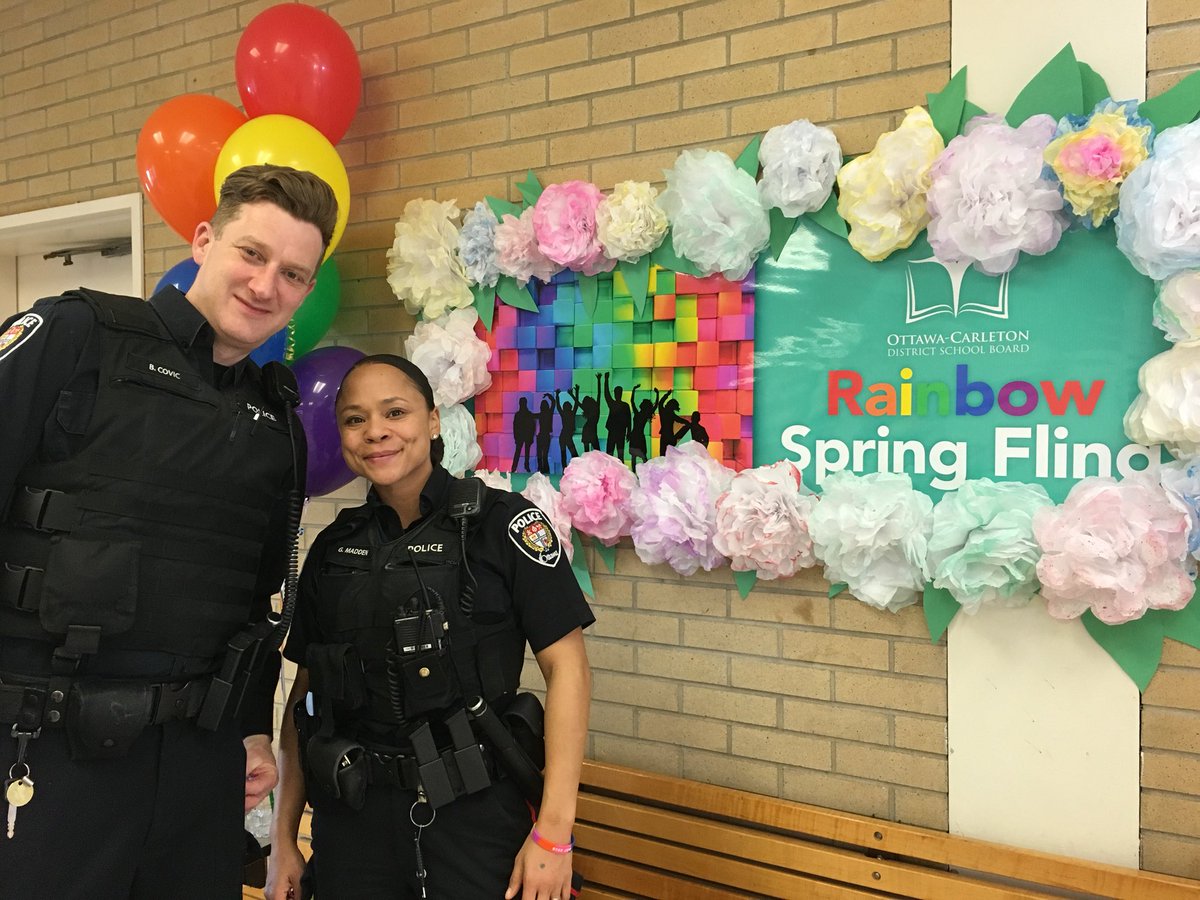 codavison's tweet photo. Ottawa Police volunteering their time at the Rainbow Spring Fling. Everyone plays a part in contributing to the safe and caring space for our students. @OttawaPolice @OCDSB @SirWilSS https://t.co/XFwszea0kL