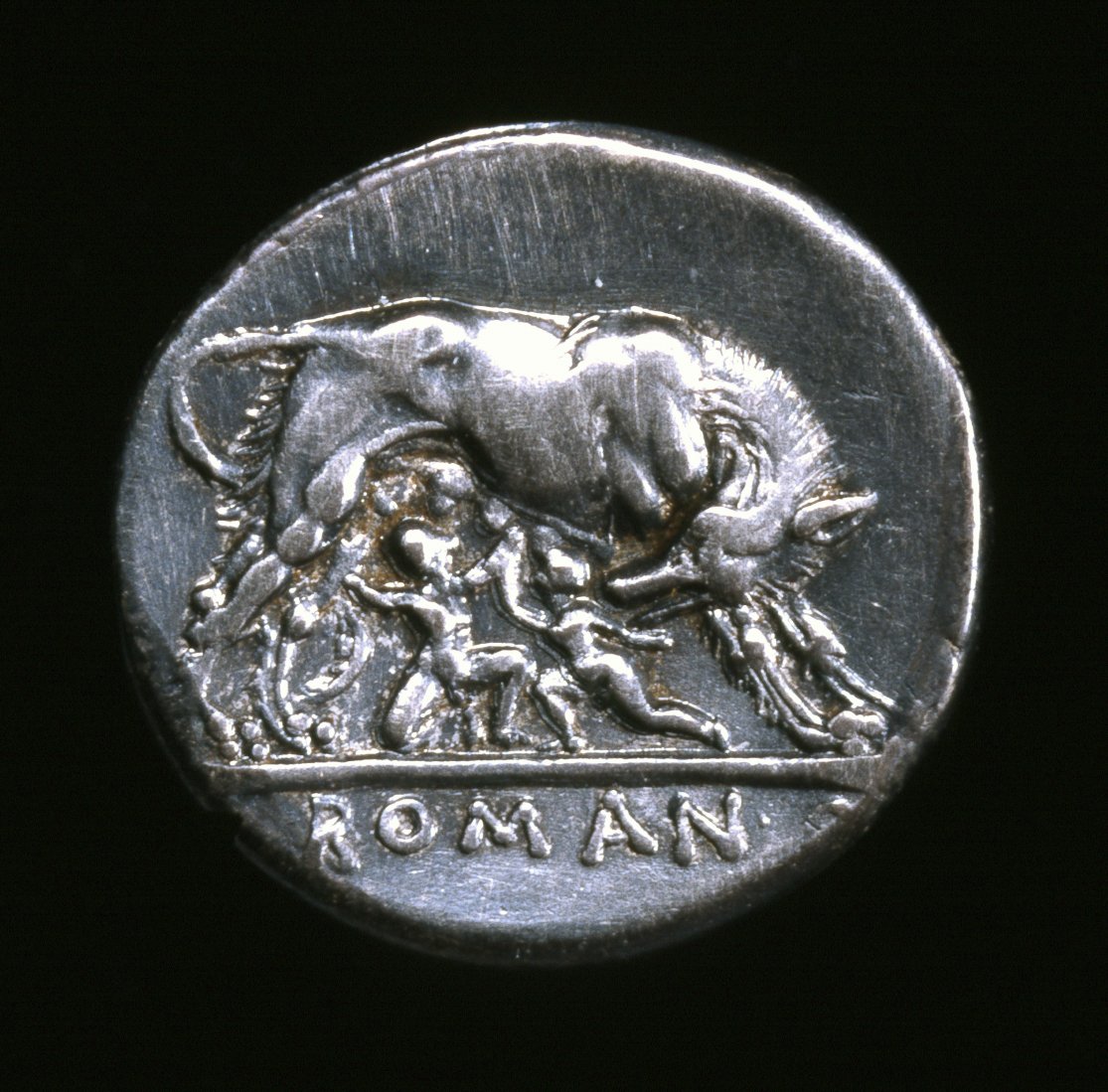 britishmuseum's tweet photo. Legend has it Romulus founded Rome #onthisday in 753 BC. This coin shows him with his twin brother Remus – according to the story the infants were suckled by a wolf https://t.co/bmcEHrDESr