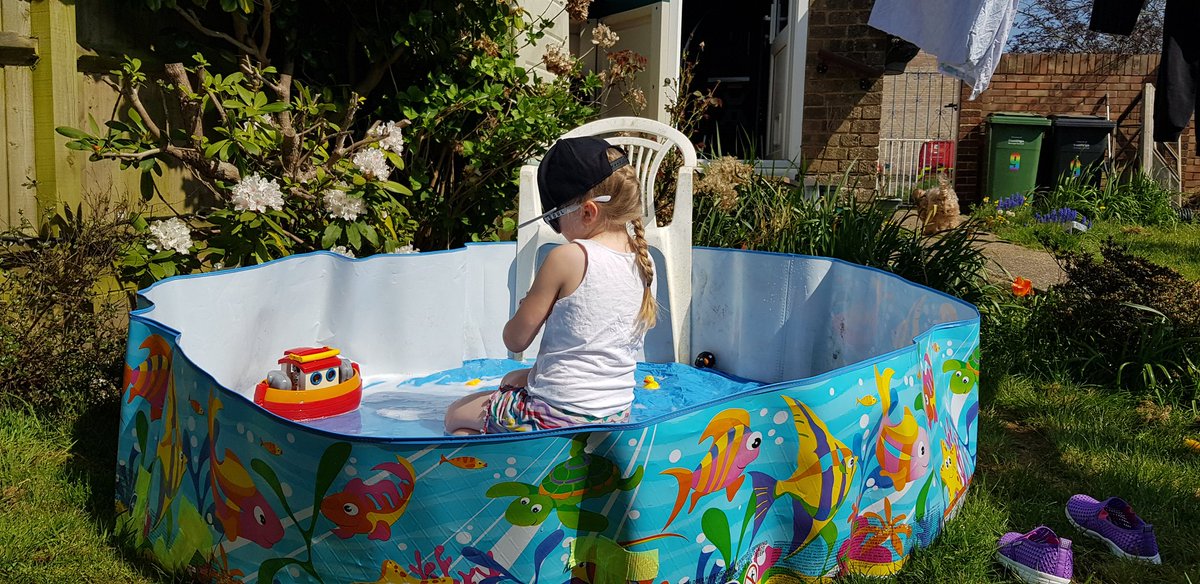 Lucyyamaha's tweet photo. Finally enjoying the paddling pool now we've got over having sun cream on, hat on, that the water is cold and that it had a few bits of grass in it. All is well as long as the water stays below her elbows. #typical7yearold not. #autismawareness https://t.co/rqwcbGSwBj