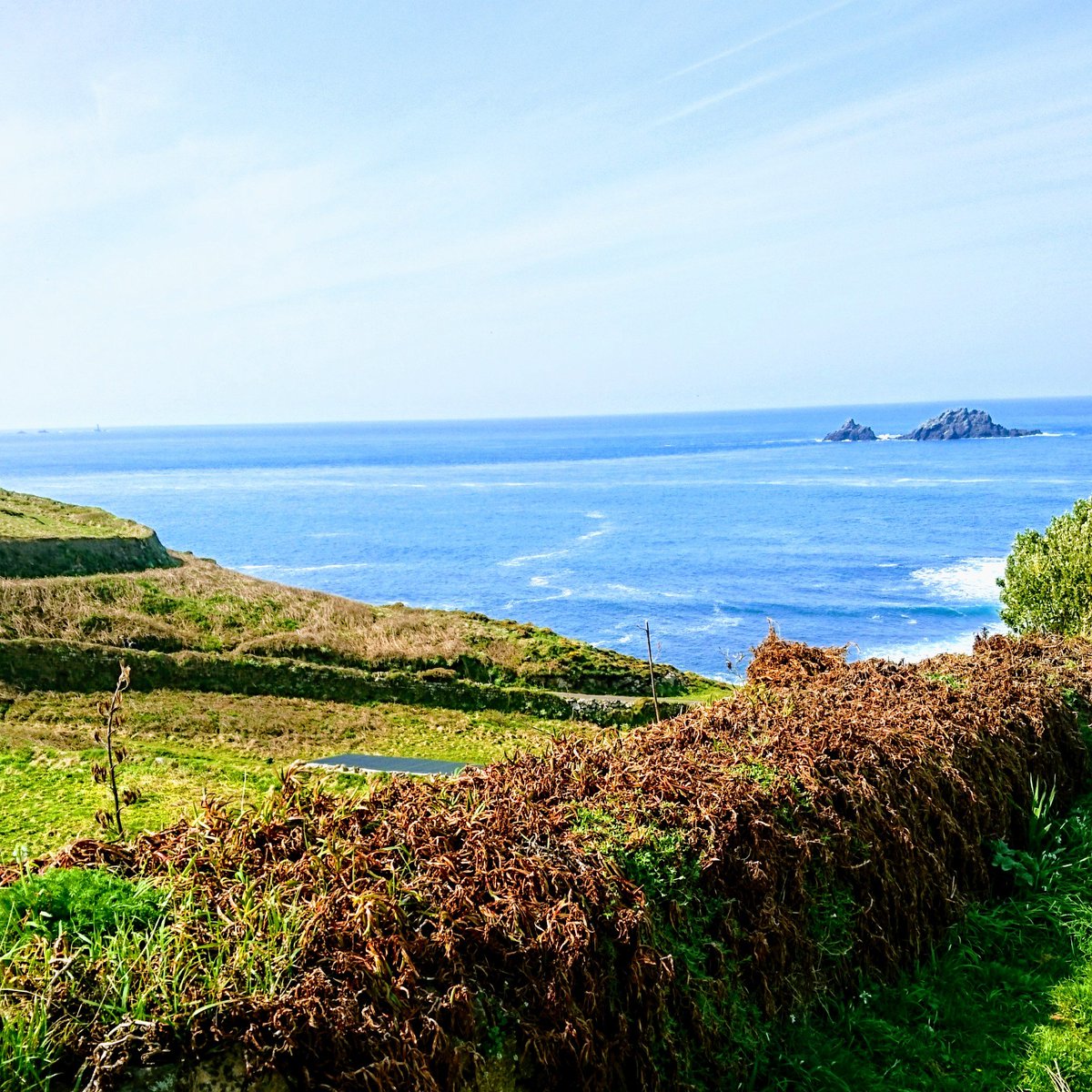 If you've got to do the washing up it might as well be with this view. Corker of a morning at Cape Cornwall. Sun, sea and delicious cake, it doesn't get better.