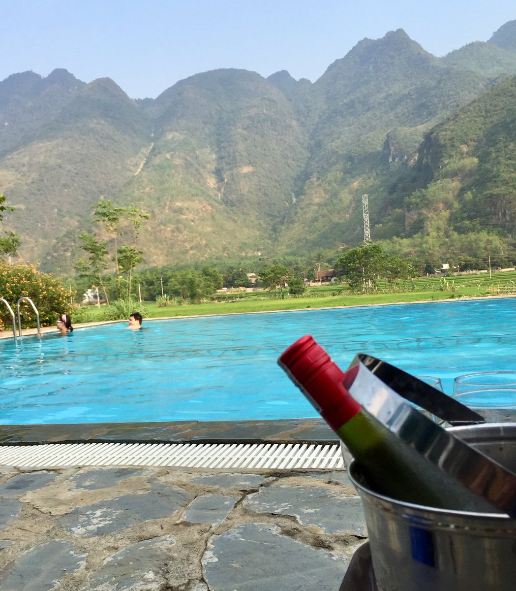 Sharing the #pinksocks love 💖 After a long, hot day that pool (and wine) were the best! #Vietnam #lovethelocals