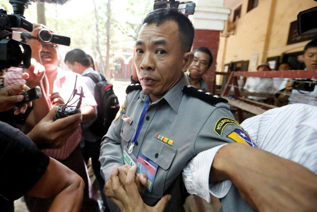 Reuters's tweet photo. Family of Myanmar policeman who described sting on Reuters reporters evicted: family https://t.co/TQTIC9yr6d https://t.co/qz8aog8RrM