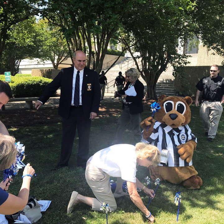 exchangeclub's tweet photo. XC of Columbus, GA, and Time-Out-Teddy, attended the Muscogee County Child Abuse Protocol signing. The club, along with other organizations, planted over 400 pinwheels to represent the child abuse cases reported so far this year. #PreventChildAbuse #WeHelpCommunities https://t.co/NMaaVtz3VG