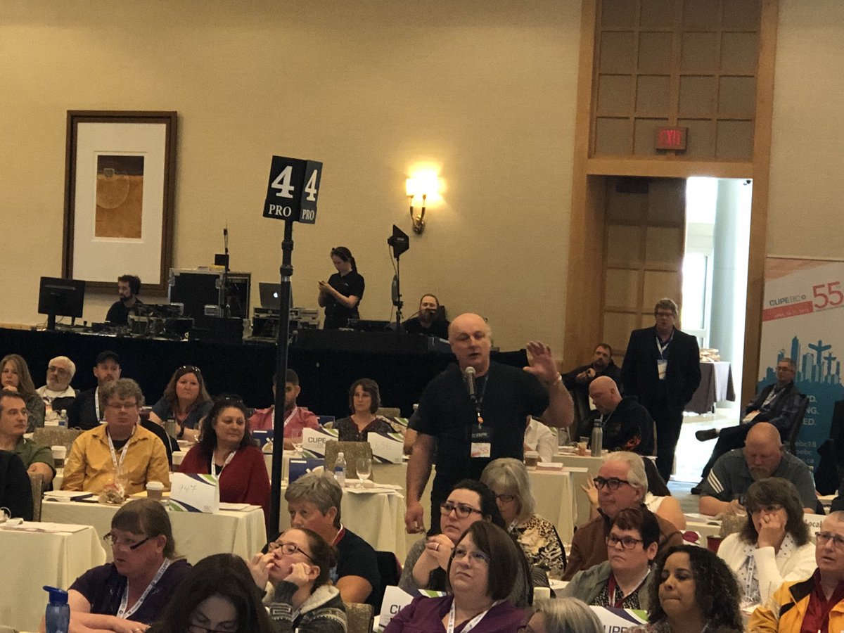 TreasurerTrevor's tweet photo. I’m re-living the @cityofcolwood glory days with vol. Fire Fighter Tim Hamblin (and Local 459 member) at the microphone during #cupebc18 https://t.co/6yUyuDDoc8