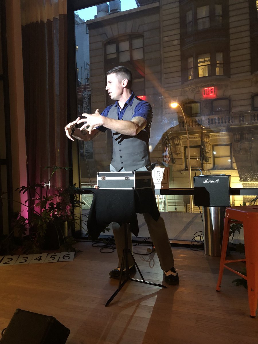 Being entertained and amazed by @Magic_Brian at #rsvp@arlo